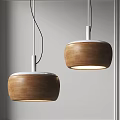 Two Modern Wooden Pendant Lights With White Top And Warm Illuminated Glow