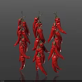 Vibrant Red Chili Peppers Strung Together In Three Hanging Bunches