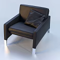 Modern Black Leather Single Sofa With A Pillow And Silver Metal Legs