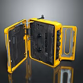 Yellow Protective Device Case Open Showing Internal Buttons And Ports Details