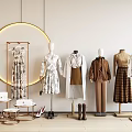 Mannequins In Clothing Store Wearing Various Styles With Circular Light Shoes Bags And Tables