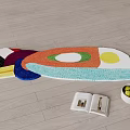 Artistic Shaped Rug On Wooden Floor With Book And Fruit Bowl
