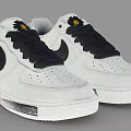 White Nike Sneakers With Black Laces And Small Yellow Flower On Tongue