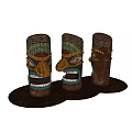Decorative Wooden Columns With Intricate Carved Faces And Vibrant Colorful Patterns