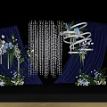 Banquet Hall Decorated With Navy Blue Curtains Crystal Drapes And Floral Arrangements