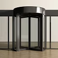 Sleek Black Frame Revolving Door With Glass Panels And Wooden Floor