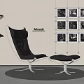 Black Leather Minotti Lounge Chair with Ottoman Floor Lamps and Modern Black White Photo Wall