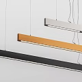 Modern Linear Pendant Lights Black Gold and Silver Hanging in Minimalist Home Interior Design