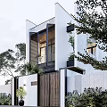 Stylish Modern Detached Villa Exterior With Large Lattice Windows And Green Plants
