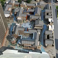 Traditional And Modern Commercial Street With Gray Tiled Roofs Water Channels And Open Plazas