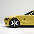 Yellow Two Door Sports Car With Sleek Design Black Windows And Silver Wheels