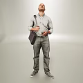 A Man Standing In Light Background Wearing Light Shirt And Jeans Carrying Bag Checking Smartphone