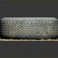 Old Tire With Deep Tread Pattern Placed On Grass And Leaves Platform 3d model