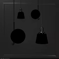 Modern Glass And Metal Pendant Lights With Different Shapes Illuminated In Dark Background