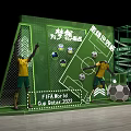 FIFA World Cup 2022 Football Themed Display With Green Decor And Yellow Jersey Figures