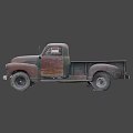 Rusty Vintage Truck Parked On Mountain Road Under Overcast Sky