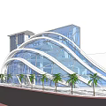 Modern Museum Building with Curved Glass Facade and Open Entrance Surrounded by Palm Trees