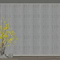 Gray Vertical Striped Background Wall in Interior With Decorative Stones Yellow Branches And Wooden Floor