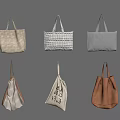 Different Styles of Stylish Fabric Tote Bags in Various Colors Hanging on Wall