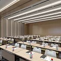 Modern Conference Room Interior Design With Long Tables Chairs Bottled Water Notebooks And Large Screen