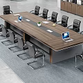 Modern Office Conference Table With Black Chairs Laptop Green Plant Documents And Gray Carpet
