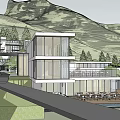 Modern Multi Story Guesthouse With Large Windows Balconies Trees And Mountain View