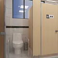 Public Toilet Exterior View With Beige Walls Front Green Shrubs Against Urban Tall Buildings