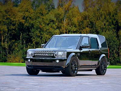 Stylish Black Land Rover SUV Parked on Stone Pavement with Autumn Forest Background 3d model