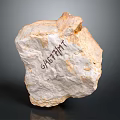 Natural G657HT Stone Rough Block With Engraved Markings On Surface