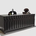 Black Entryway Console Cabinet With Geometric Design And Decorative Elephant Figurines Purple Flowers