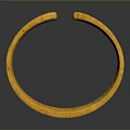 Elegant Golden Metal Bracelet With Intricate Carved Textured Surface Patterns