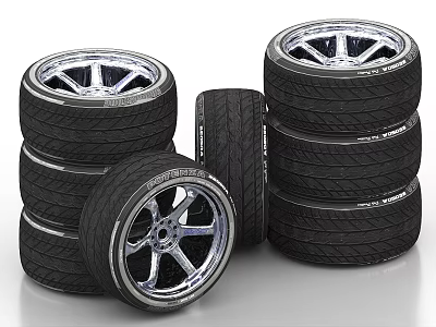 Stacked Car Tires With Silver Alloy Wheels And Black Rubber Treads 3d model