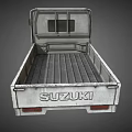 Old Rusty Suzuki Flatbed Truck With Open Cargo Bed And Weathered Body