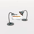 Two Vintage Metal Table Lamps With Curved Arms And Round Bases