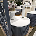 LIVE IN LIGHTHOUSE Store Interior Design With Display Cabinets Plants And Chandeliers