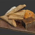 Freshly Baked Flaky Pastries and Assorted Bread Loaves on Wooden Board
