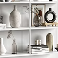 Stylish Decorative Ornaments Set On White Shelf With Vases Books Sculptures And Frames