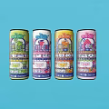 Colorful Canned Beverages With Various Labels Arranged In Row On Blue Background