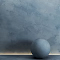 Single Bed in Minimalist Room with Grey Wall and Colored Spherical Ornaments