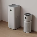 Two Modern Air Purifiers Tower And Cylindrical Design In Indoor Corner With Wooden Floor