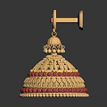 Golden Decorative Household Item With Red Gemstones And Intricate Carved Design