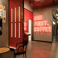 Modern Coffee Shop Interior With Neon But First Coffee Sign Red Brick Wall And Tables