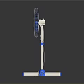 Modern Standing Electric Fan With Blue Blades And White Base For Home Cooling Use