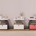 Three Different Colored Bedside Tables With Decorative Vases Books And Drawers In Modern Bedroom Setting