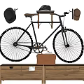 Vintage Bicycle With Leather Seat Hats And Leather Bag On Wooden Cabinet Drawers