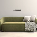 Green Two Seater Sofa with Light Pillows and Black White Geometric Blanket on Light Wall
