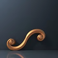 Elegant Golden Curved Scroll Decorative Carving Piece With Intricate Details Against Dark Background