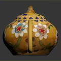 Decorative Yellow Teapot With Vibrant Floral Patterns And Golden Handle Spout