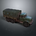 Vintage Military Green Truck With Canvas Cover And Six Wheels Design