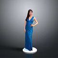 Child In Blue Long Dress Standing On White Base With Gray Background